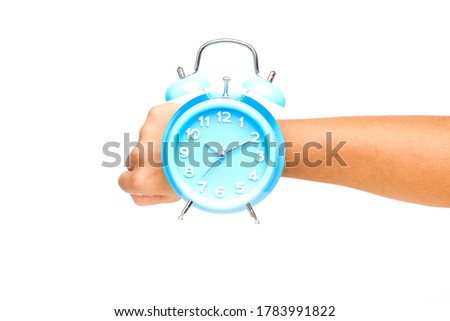 A levitation concept picture of table clock above hand. Time management and success planning concept