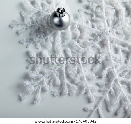 silver christmas ball with snow
