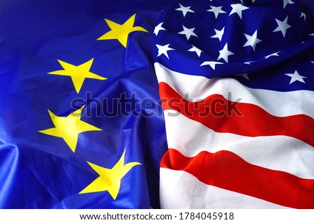 USA Flag vs Europe Flag. EU flag and American flag background.