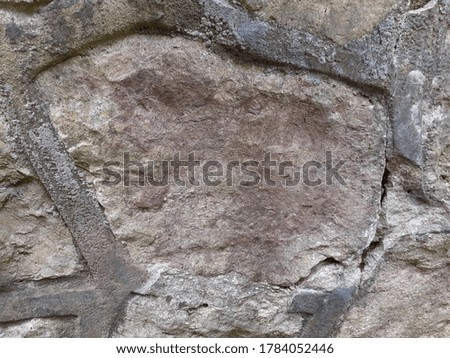 old stone wall outdoors in summer