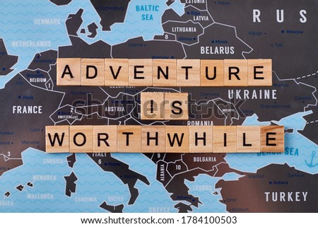 Adventure is worthwhite slogan. Travel company slogan idea. Black map of europe.