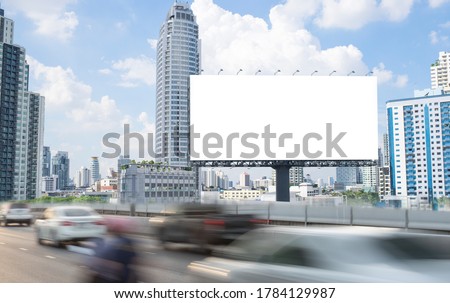 Blank template for outdoor advertising or blank billboard on the highway with clipping path on screen - can be used for trade shows, and advertising or promotional poster. Royalty-Free Stock Photo #1784129987