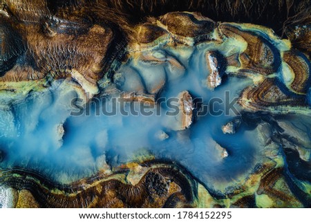 Abstract nature background. Colorful vibrant puddle in Iceland
