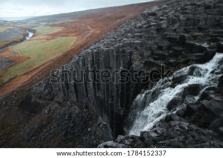 Studlafoss waterfall with basalt columns in East Iceland