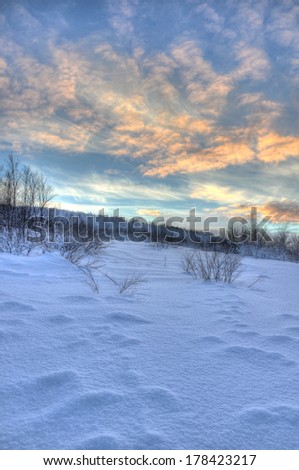 Evening in snowy desert Royalty-Free Stock Photo #178423217