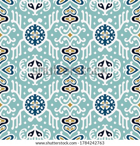 Tribal vector ornament. Seamless African pattern. Ethnic carpet with chevrons. Aztec style. Geometric mosaic on the tile, majolica. Ancient interior. Asian rug. Geo print on textile. Kente Cloth.