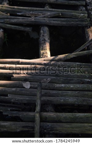 Old brown wooden vintage bridge broken with ray of light photography for wallpaper background