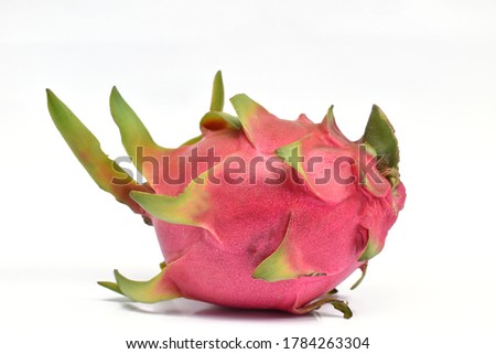 Red dragon fruit isolated from a white background