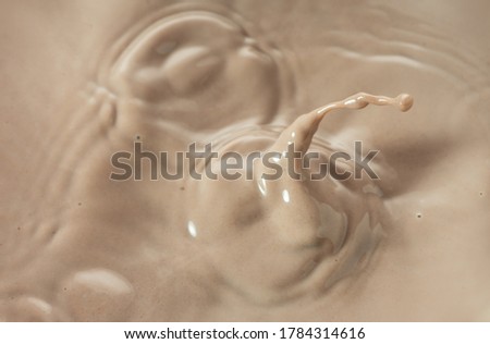 Beautiful splash of cocoa (chocolate) close up
