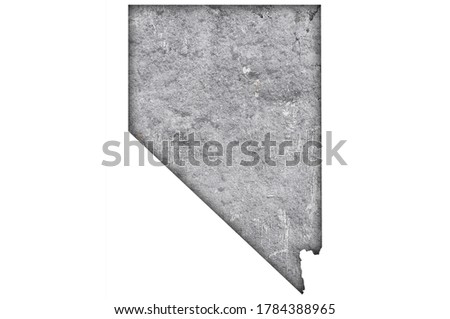 Detailed and colorful image of map of Nevada on weathered concrete