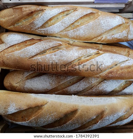 Macro photo food freshly baked bread. Background texture bread baguette bread. Stock photo fresh backed bread