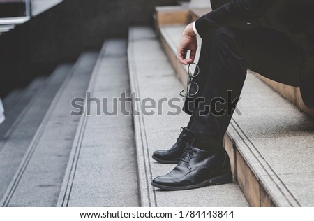Unemployed Jobless People Crisis who Recession, Stress and lose job. Despair office People feel Stressful in depress situation. Middle aged people despair low economic crisis. Stressed Jobless Concept Royalty-Free Stock Photo #1784443844
