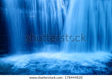 cascade in the forest in the night