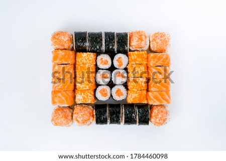 Sushi and rolls photographed on a white background
