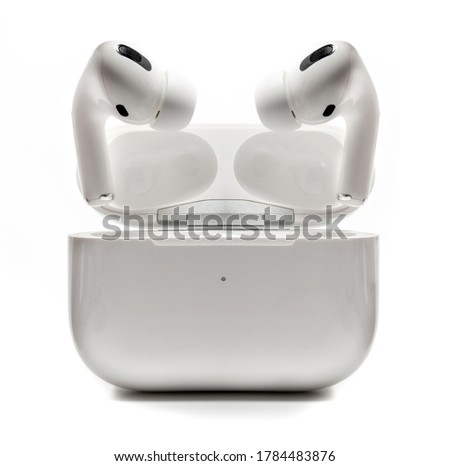 Air Pods Pro with Charging Case. Wireless Headphone Isolated on White Background Royalty-Free Stock Photo #1784483876