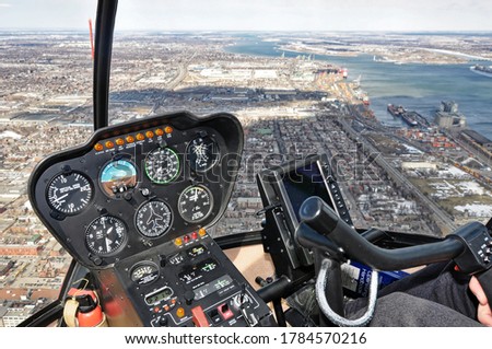 Cockpit of a helicopter in flight overhead Montreal 