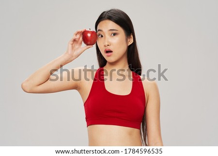 Diet food slender woman with red apple 