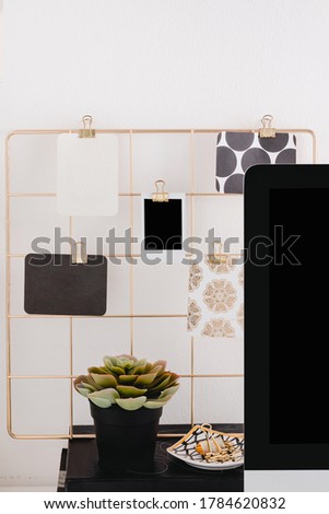 Gold desktop office cards and photos  in a white background