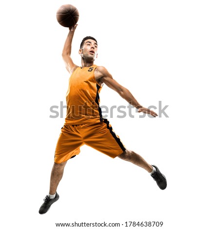 Isolated basketball player in action with a ball on white background Royalty-Free Stock Photo #1784638709