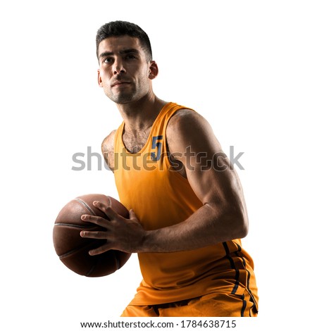 Isolated basketball player in action with a ball on white background Royalty-Free Stock Photo #1784638715
