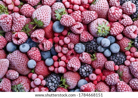 Mix of different frozen berries as background, top view Royalty-Free Stock Photo #1784668151