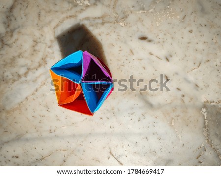 Origami Paper Pen Stand - Top View (Background / Abstract)