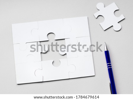 Fill the missing parts fragment of white jigsaw concept puzzle for business with completing the team with final person