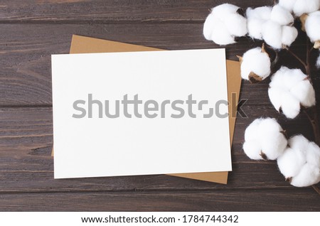 Mockup card with cotton flowers. Template invitation postcard and flowers. Natural, eco-friendly concept.