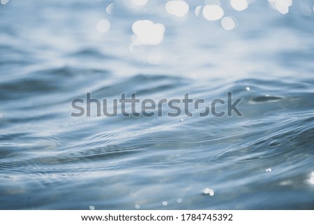 Close up of sea wave, low angle view. Selective focus, bokeh