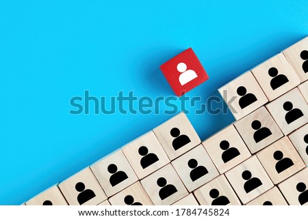 Concept of recruitment, hiring, promotion or team building in business. Wooden cubes with employee icons.  Royalty-Free Stock Photo #1784745824
