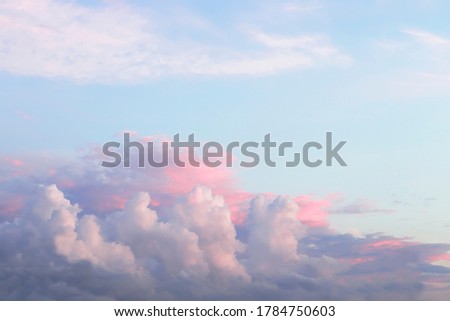 sky with blue, white and pink storm clouds at the bottom. sunset sky. nature background