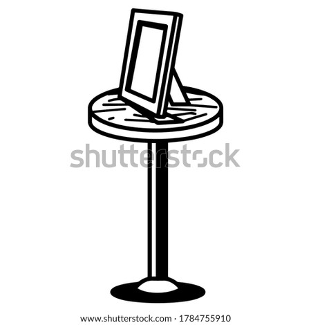 Table icon with photo frame. Home decoration - Vector