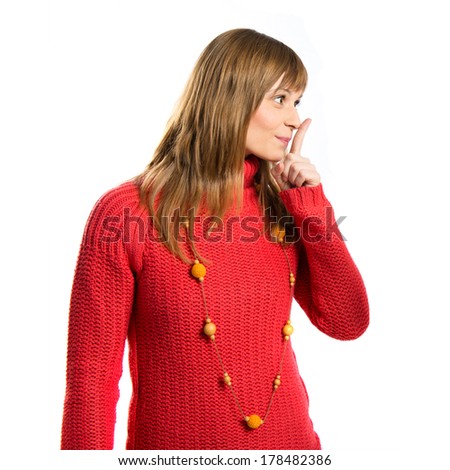 Young girl making silence gesture over isolated white background 