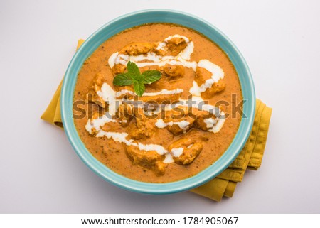 Tasty butter chicken curry or Murg Makhanwala or masala dish from Indian cuisine Royalty-Free Stock Photo #1784905067