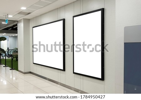 Billboard mock up inside department store. Template of an interior empty information billboard, Mock-up of a shopping mall banner placeholder and poster.