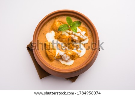 Tasty butter chicken curry or Murg Makhanwala or masala dish from Indian cuisine Royalty-Free Stock Photo #1784958074