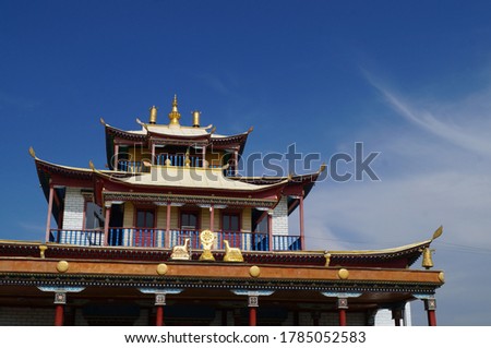 The photo shows the Ivolginsky datsan. This place is a sacred for Buddhists. Every year a huge number of tourists come here.  Royalty-Free Stock Photo #1785052583