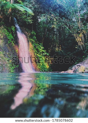a waterfall with twilight beauty