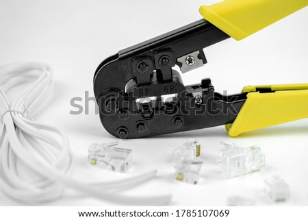 internet or telephone line cables and crimper, Twisting Cable Tool Twisted Pair Ethernet UTP Cat 5, Crimping RJ45 LAN cable, Stepping to crimping RJ45 connector