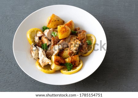 Greek Style Roasted Chicken, Potatoes, Parsely and Lemon