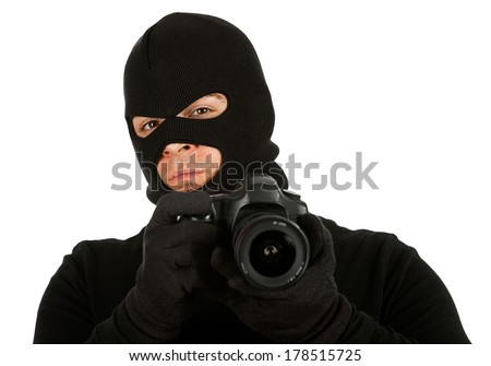 Burglar: Man Holding Camera as Criminal Photographer