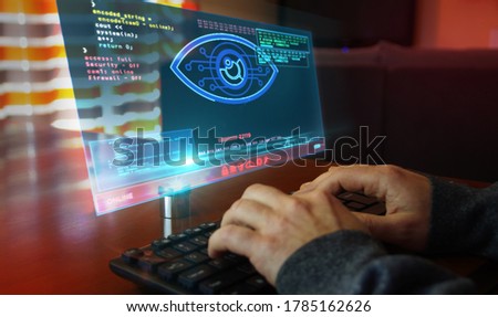Hacker spy attack with cyber eye on computer screen. Hacking, control, surveillance, supervise, digital invigilation and breach of privacy concept 3d with glitch effect. Royalty-Free Stock Photo #1785162626