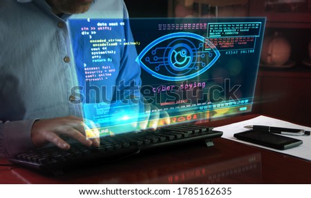 Hacker spy attack with cyber eye on computer screen. Hacking, control, surveillance, supervise, digital invigilation and breach of privacy concept 3d with glitch effect. Royalty-Free Stock Photo #1785162635