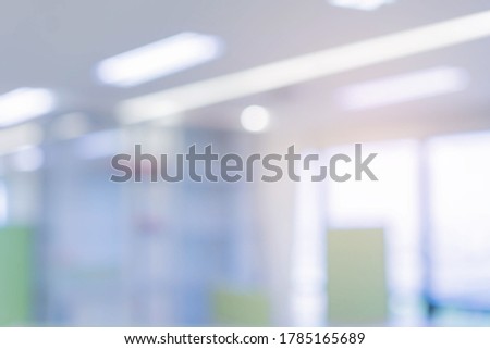 abstract blur contemporary office interior  background with shine light effect concept