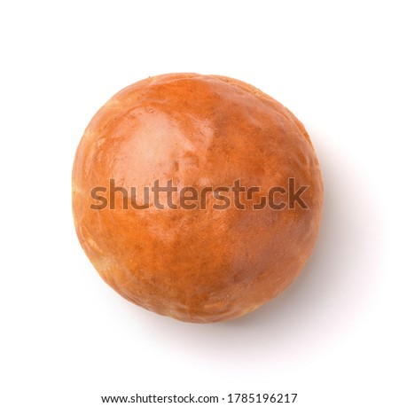 Top view of fresh baked wheat bun isolated on white  Royalty-Free Stock Photo #1785196217