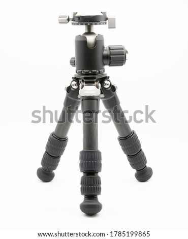 Mini photo tripod with ball head isolated on white background