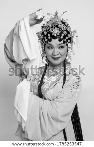 Black and white photos of actors in Asian Peking Opera