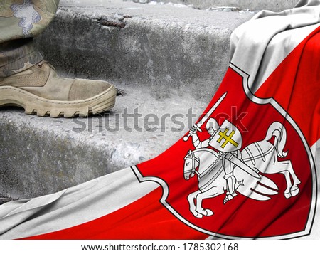 flag of Belarus lies on the stairs. Military conflict.