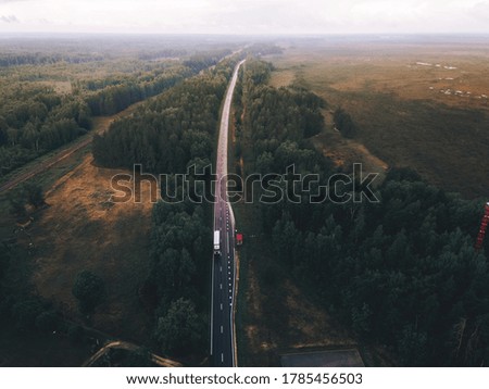 Single lane road in atvia at sunset