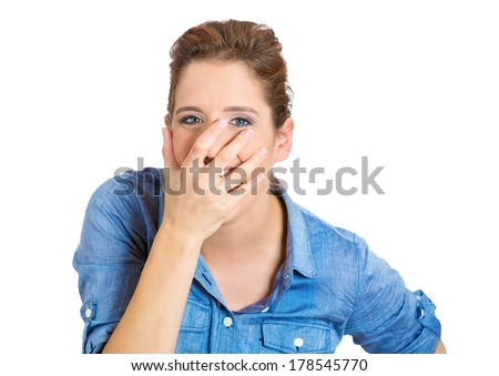 Closeup portrait of laughing young business woman, student, worker, employee, covering mouth, isolated on white background. Positive human emotions facial expressions, feelings, attitude perception